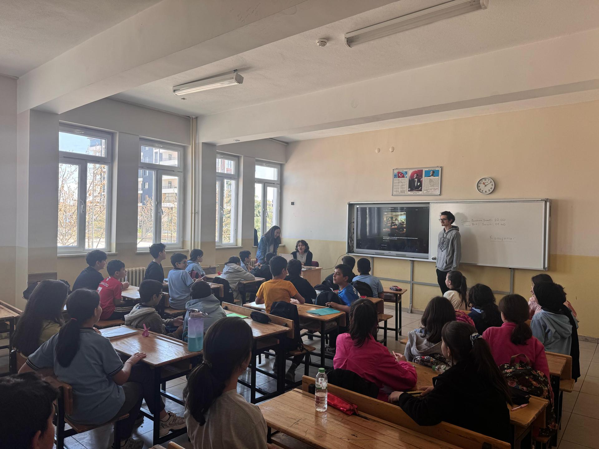 Children trying coding apps during TechFair